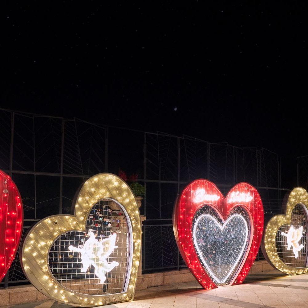 8. Love Lock Promenade adorned with LED string light and angel graphic in neon light .jpg
